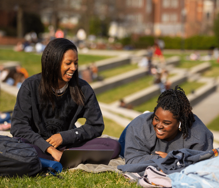 two students laying at HSS lawn